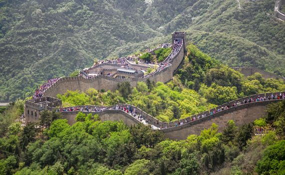 Panorama of Great Wall of China among the green hills and mountains near Beijing, China