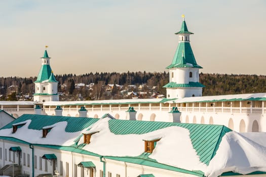 Inner yard of New Jerusalem Monastery with fortified walls and towers, Istra, Moscow region, Russia