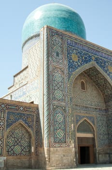 Domes and towers of Registan in Samarkand. Ancient architecture of Central Asia