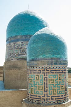 Domes and towers of Registan in Samarkand. Ancient architecture of Central Asia