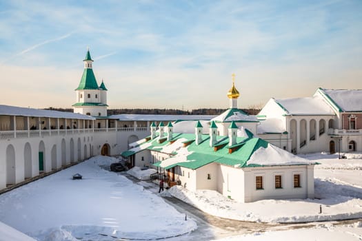 Inner yard of New Jerusalem Monastery with fortified walls and towers, Istra, Moscow region, Russia