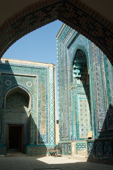 The arch and the exterior design of the ancient Registan in Samarkand. Ancient architecture of Central Asia