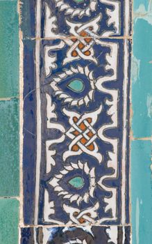 asian old ceramic mosaic. elements of oriental ornament on ceramic tiles