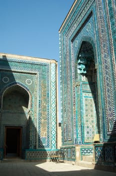 The arch and the exterior design of the ancient Registan in Samarkand. Ancient architecture of Central Asia