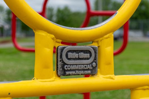 "Brighton, Ontario/Canada - 07/22/2019: Little tikes commercial logo on bright outdoor playground."