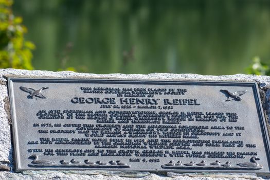 "Ladner, British Columbia/Canada - 7/25/2019: George Henry Reifel plaque in remembrance of donated land for birding santuary in Canada." in remembrance of donated land for birding santuary in Canada."