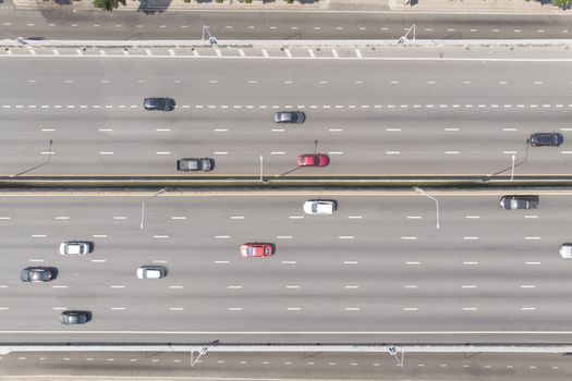 Aerial top down view of  cars on the expressway street