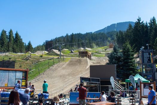 "Whistler, British Columbia/Canada - 08/07/2019: Whistler village summer mountain biking activity Crankworks looking at the mountain and obstacles constructed for jumping and racing.."