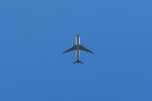 Bottom View of the Airplane in the sky with blank copy space for travel comcept