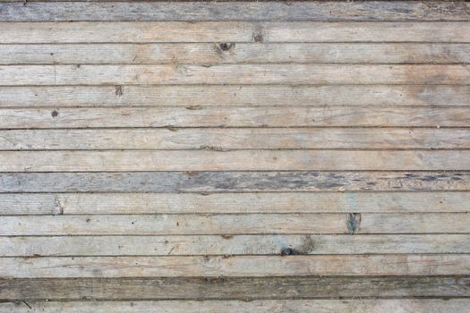 flat texture and background of horizontal gray thin solid wooden planks - old, and worn out