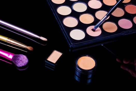 Make-up brushes. Eye shadow palette. Makeup kit. Cosmetic set. Beauty, fashion, style and skin care.	