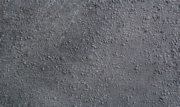 The texture of the old gray wall. Grunge, steampunk, rock, vintage. Uneven dirty rough background