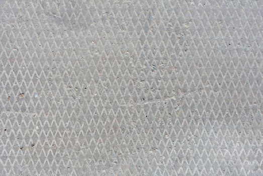 seamless old flat concrete texture with diamond pattern and signs of light erosion.