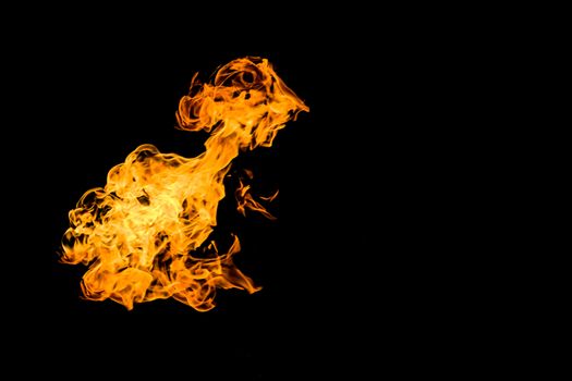 Fire on black background. Fiery patterns. Burning flame. Blazing fire.