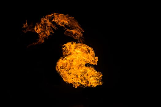 Fire on black background. Fiery patterns. Burning flame. Blazing fire.