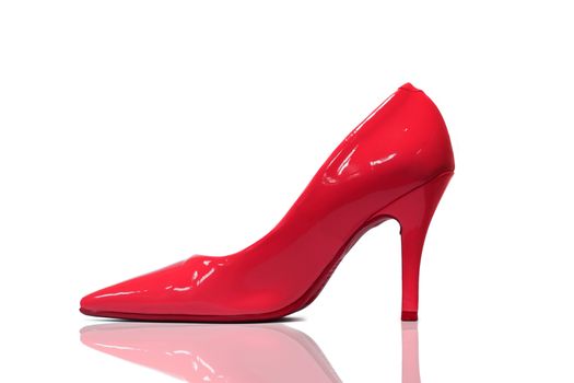 Isolated red high heel shoe with shoe reflexion