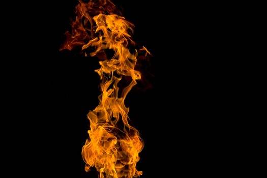 Fire on black background. Fiery patterns. Burning flame. Blazing fire.	