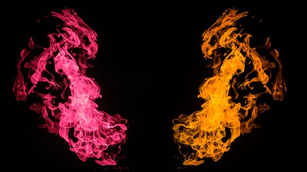 Colored fire on black background. Flaming patterns and abstract smoke. Concept, idea, project.