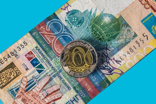 New coin 200 tenge in Kazakhstan. Paper banknotes tenge KZT. Tenge is the national currency of Kazakhstan. bank of Kazakhstan