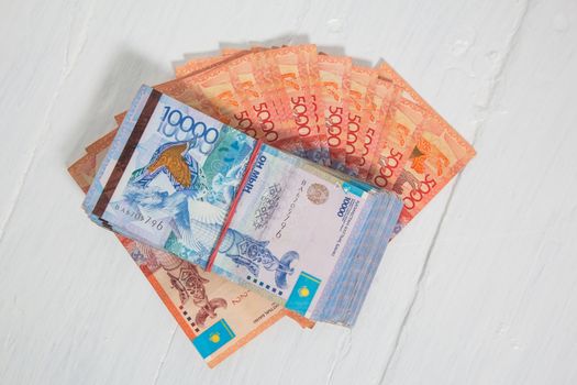 Tenge KZT on white background. Banknotes tenge. Money Kazakhstan Tenge