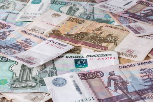 Paper banknotes Russian Rubles. Rubles is the national currency of Russia. bank of Russia The Russian ruble background. A thousand rubles close-up. Fall or rise of the ruble.