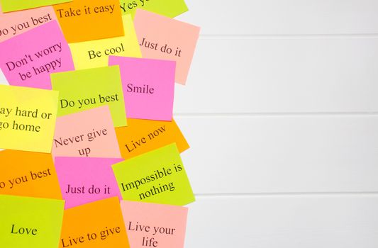 Motivational words on colorful stickers on white background. A vision Board. Copy space. Cards with words. Affirmation, development, training, seminar. Plan, strategy, concept. Creativity
