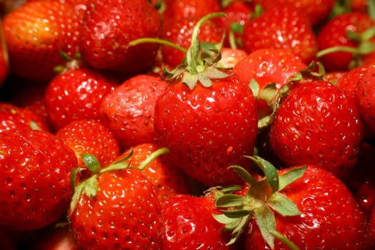 red organic strawberries fruit, macro close up