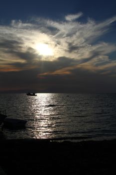 Red purple orange sunset over sea, beautiful cloud space