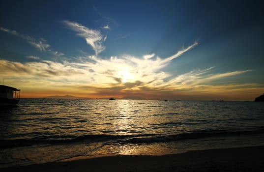 Red purple orange sunset over sea, beautiful cloud space