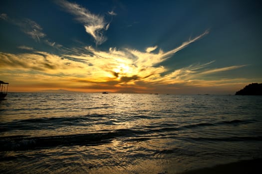 Red purple orange sunset over sea, beautiful cloud space