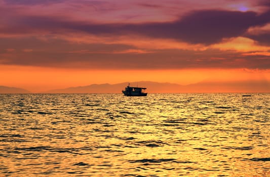 Red purple orange sunset over sea, beautiful cloud space