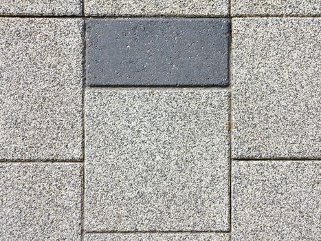 Seemingly pattern of grey color concrete road pavement brick of the pedestrian pathway