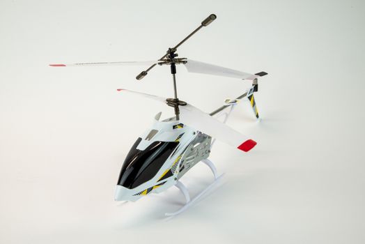 white propeller electric helicopter model