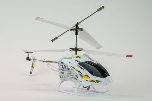 white propeller electric helicopter model