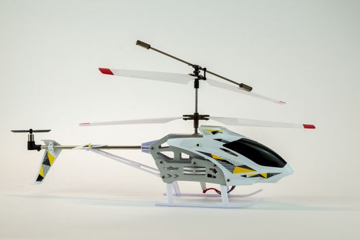 white propeller electric helicopter model