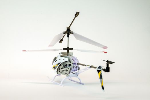 white propeller electric helicopter model