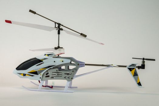 white propeller electric helicopter model