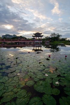 Melati Lake, Perlis, Malaysia Chinese Architechtural Bridge in morning.
