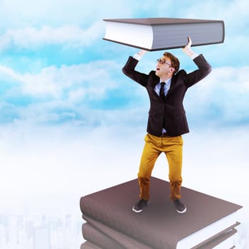 Businessman holding against clouds over city