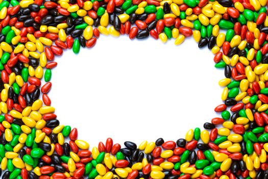 Hundreds of small gloss glazed sunflower seeds multicolor flat round mockup frame with selective focus. Central area isolated on white backgroud.
