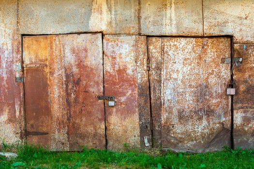 rusted painted white tin metal closed barn doors