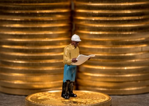 Concept illustration of miners looking for new gold eagle US Treasury golden coins