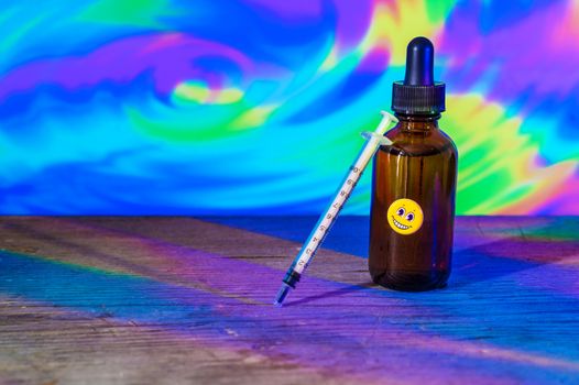 Conceptual image of a bottle of diluted LSD used for microdosing