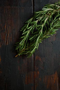rosemary, which lieson wooden old vintage table Side view Close up macro.