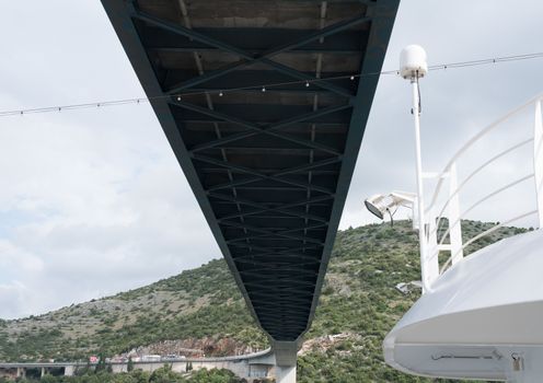 Cruise ship docked under the Franjo Tudman bridge in the Dubrovnik cruise port near the old town