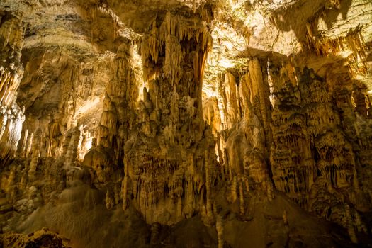 Stalactites and stalagmites underground in cave system in Postojna