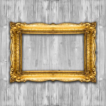 Big Old Picture Frame on wooden baclground and black area inside, mockup