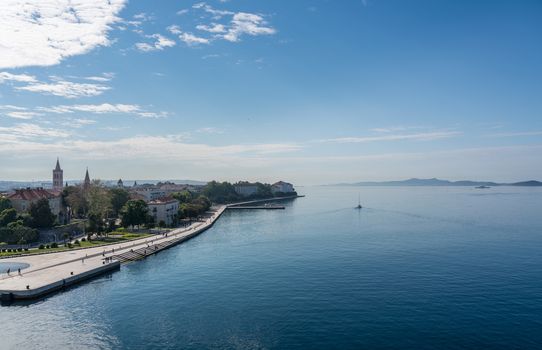 Early morning calm along the promenande by the port of Zadar in Croatia