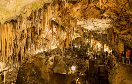 Stalactites and stalagmites underground in cave system in Postojna