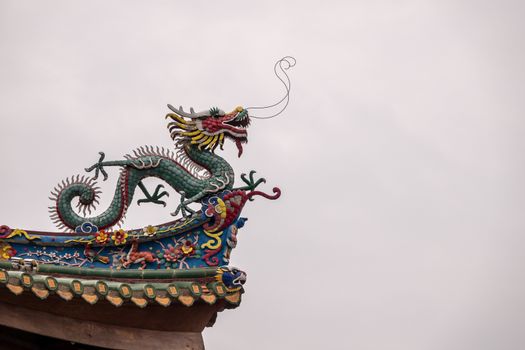 Detail of roof carvings on South Putuo or Nanputuo Temple